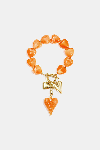 Kralenarmband met hangende harten charms