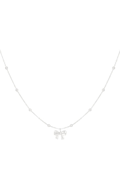ketting met balletjes en strikje