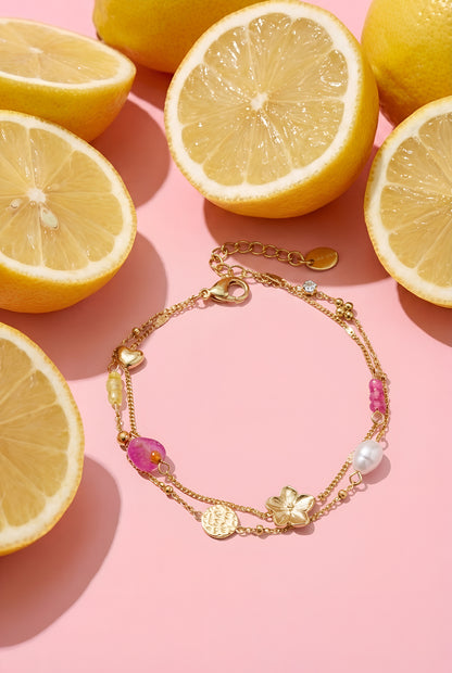 Bedelarmbanden met steentjes, kraaltjes en munt
