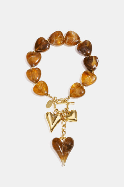 Kralenarmband met hangende harten charms