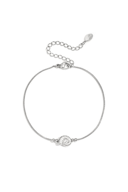 Minimalistische armband met spiraalschelp