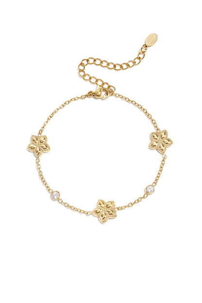 Armband met wisselend patroon van bloemen en steentjes