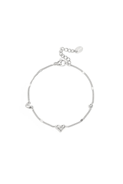 Armband met hartjes en steentjes patroon