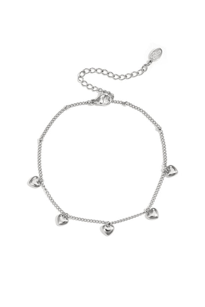 Armband met kleine hangende hartjes