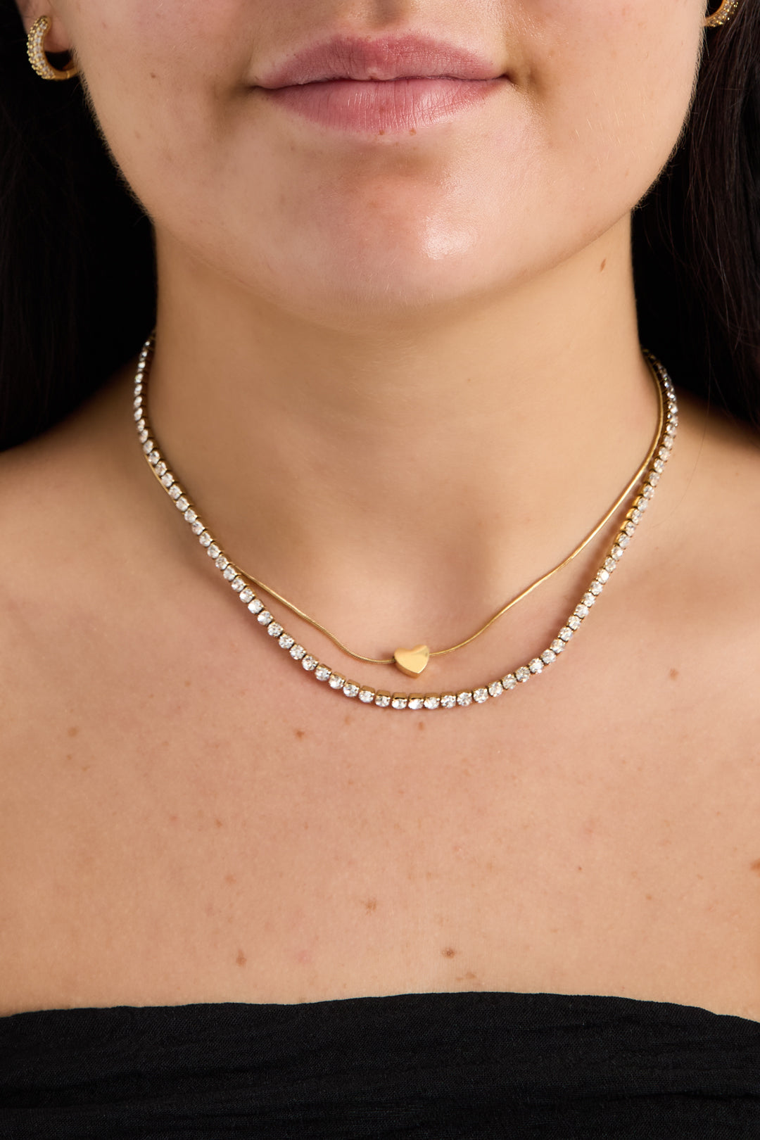 Dubbele ketting met minimalistisch hart en zirkonia