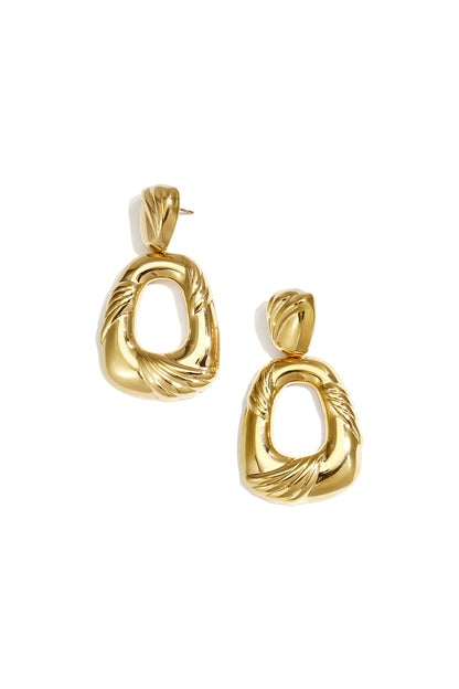 Statement oorbellen in druppelvorm met design